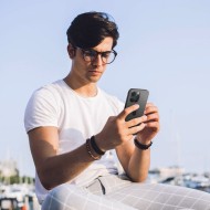 2 броя комплетки от протектори за обектви на камерата на iPhone 14/15 Pro - 14/15 Pro Max от Spigen Optik Tr - Черен 
